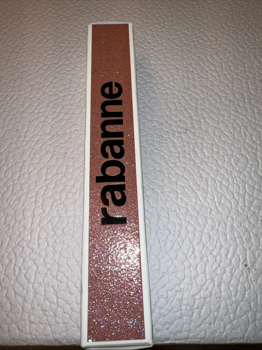Rabanne Glowies Ultra Shiny non sticky lipgloss with multidimensional pearl 091